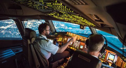 pilots-flying-in-cockpit-900x600